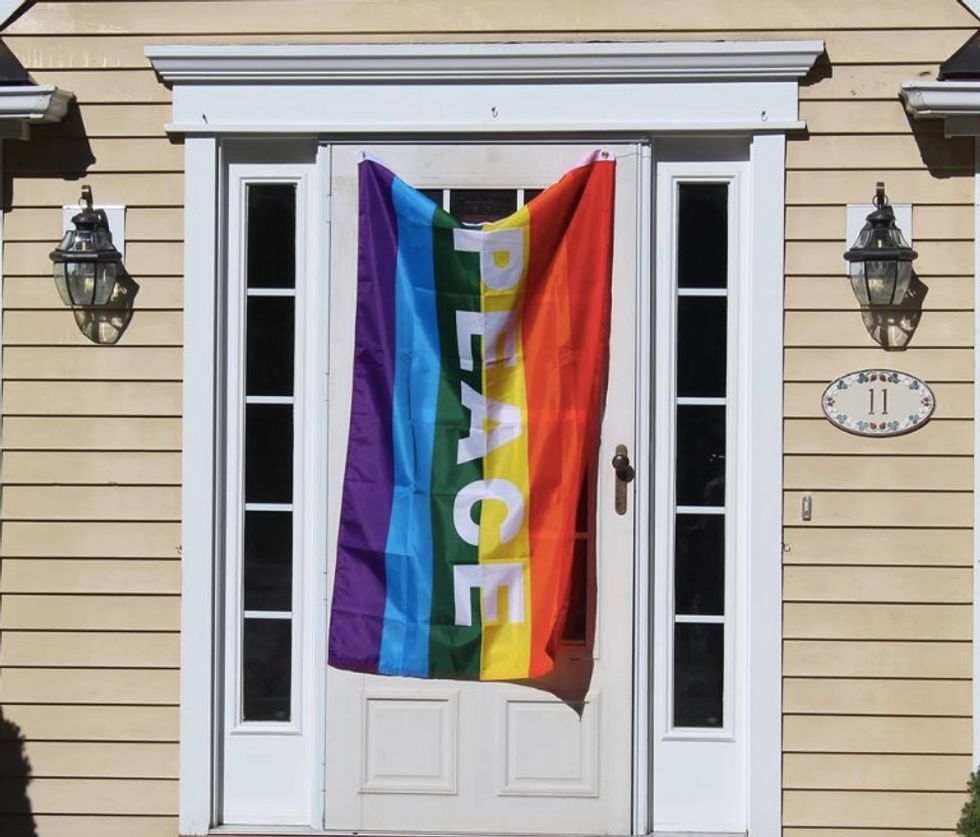 These Neighbors Hung Up 40 Rainbow Flags When A Gay Couples House Was Vandalized Upworthy