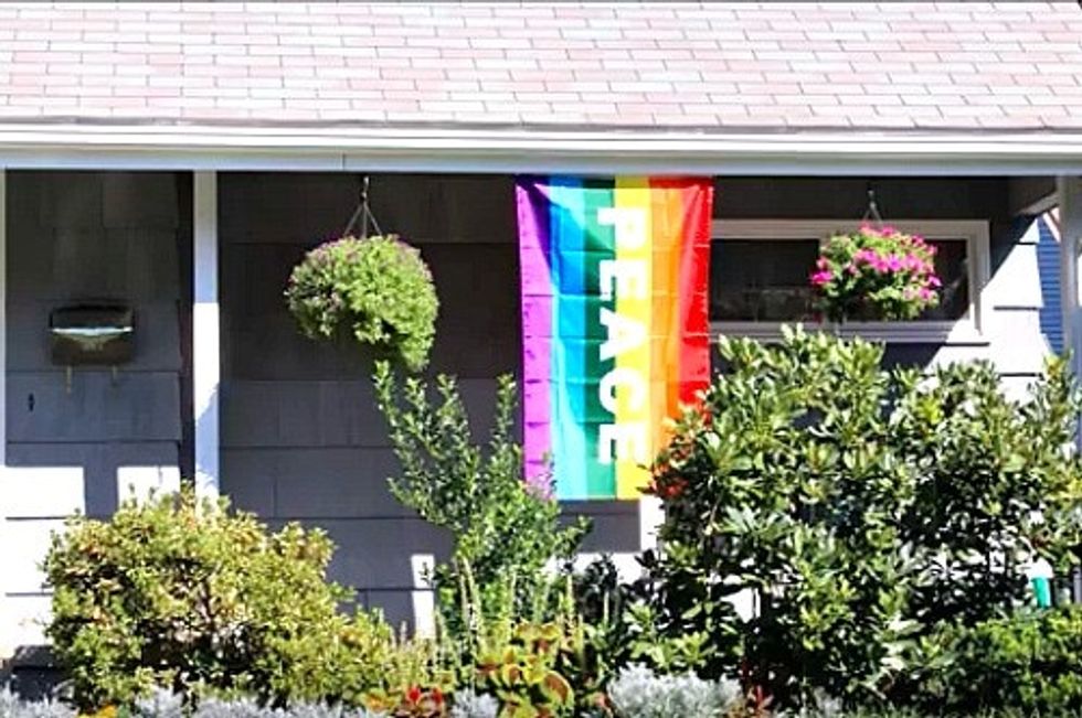 These Neighbors Hung Up 40 Rainbow Flags When A Gay Couples House Was Vandalized Upworthy