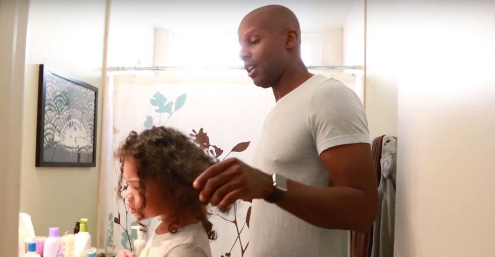 A photo of this dad doing his girl's hair went viral. Now he has something to say.