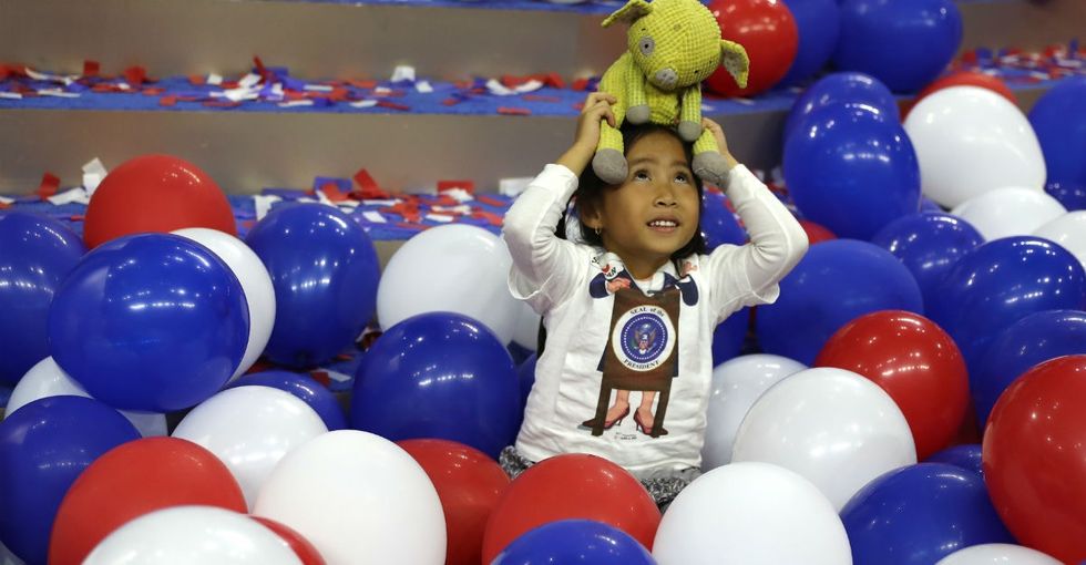 18 moving photos show the ripple effect of a female presidential candidate.