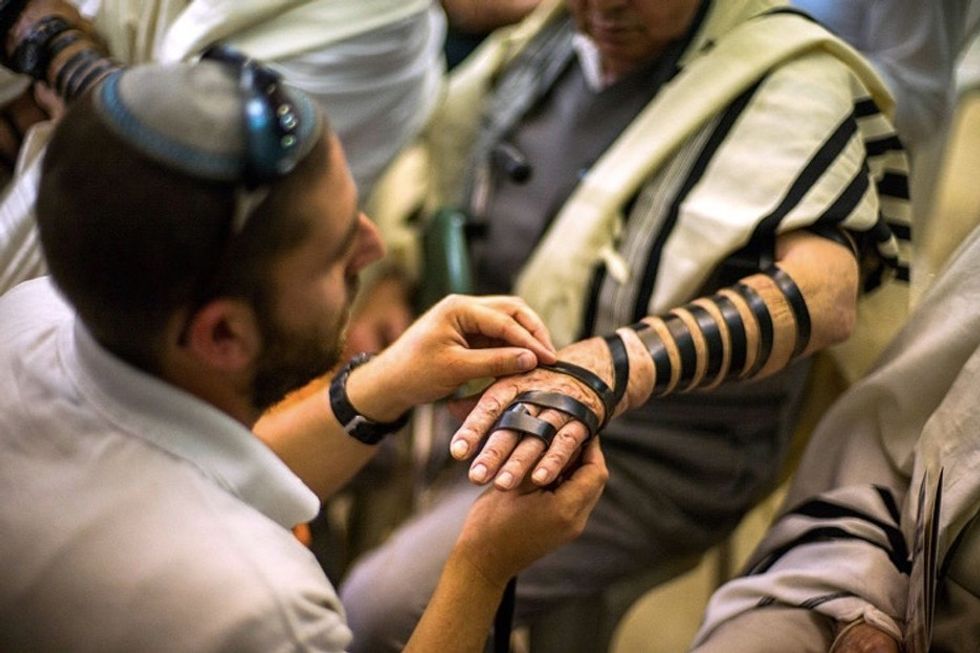 See the emotional moment 50 Holocaust survivors finally got bar mitzvahed.