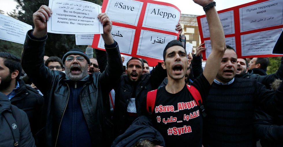 8 powerful pics show how people around the world are standing with Aleppo.
