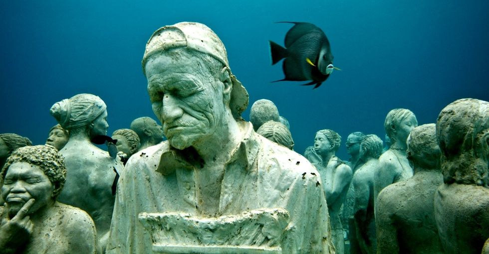Creepy? Yes. Beautiful, too. These underwater statues may help save our coral reefs.