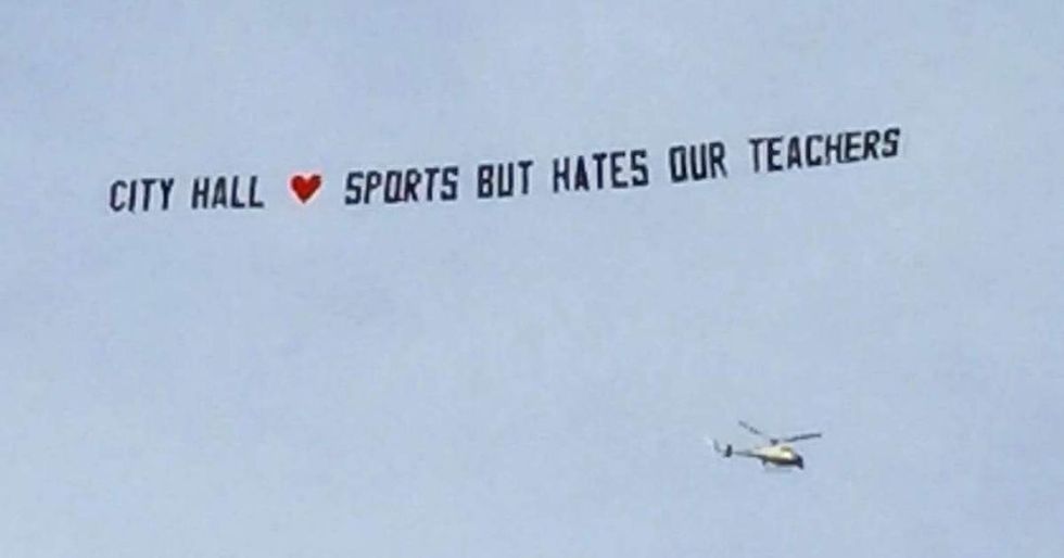 These teachers haven't gotten raises in 4 years. So they took over the NFL Draft.
