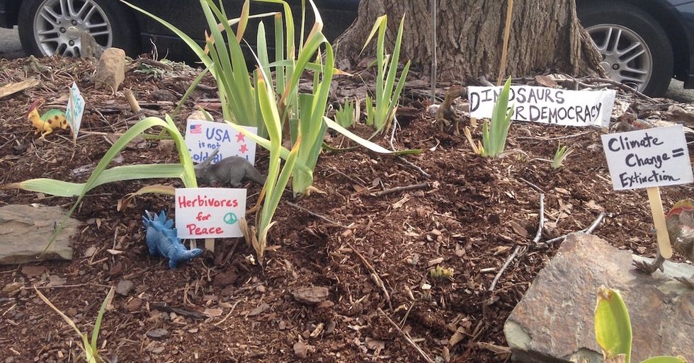 A dad helped his son make protest signs for his toy dinosaurs and they went viral.