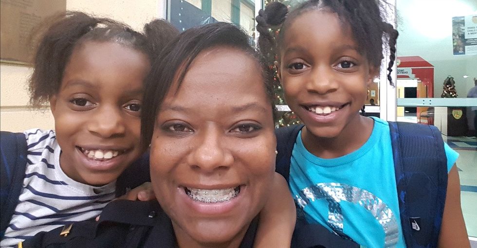 She suffered abuse as a child. Now she's a cop dedicated to making kids' lives better.