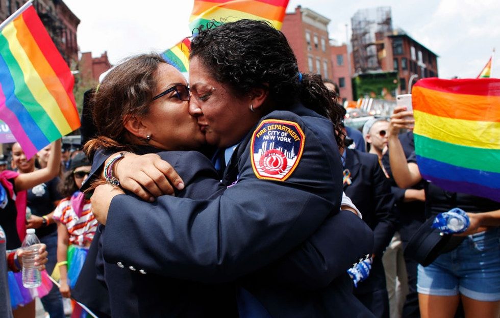 These firefighter medics stole the Pride spotlight with their surprise wedding proposal.