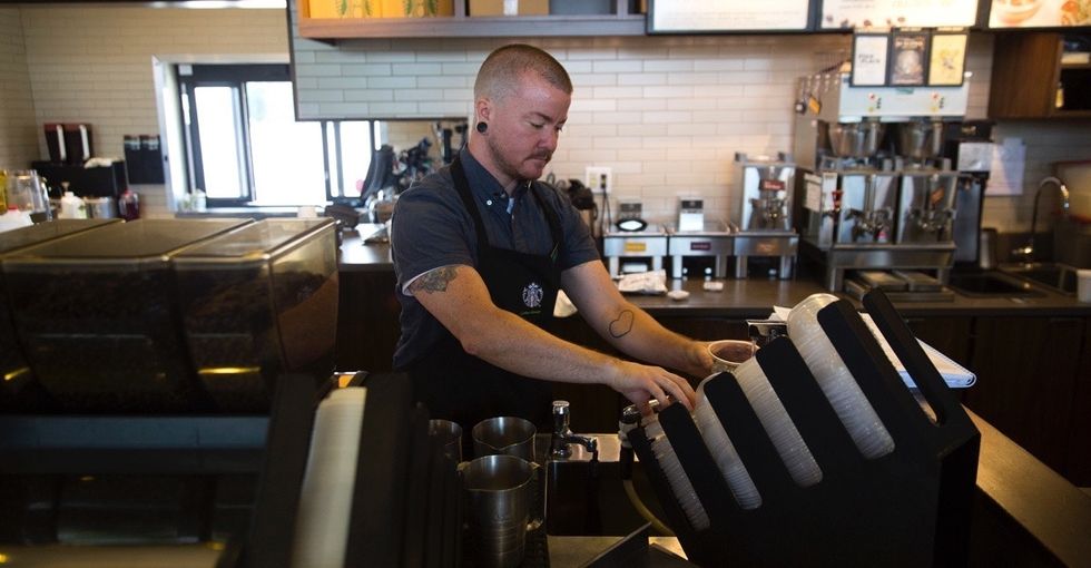 Watch a trans man explain why Starbucks' new health care plan means so much to him.