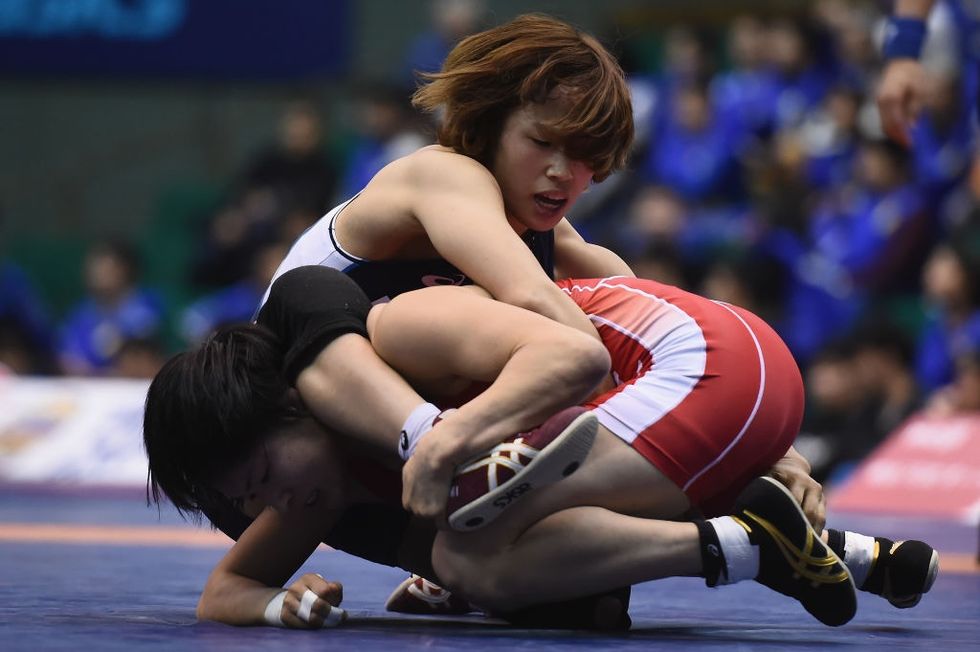 A wrestler forfeited a game so he wouldn't have to compete against a girl. Now she's clapping back in the most epic way.