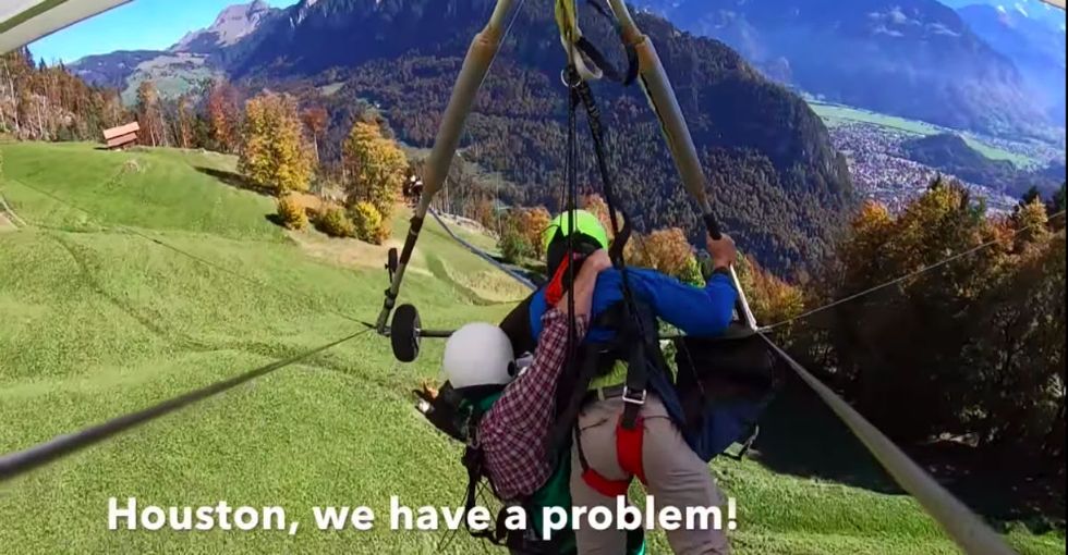Hang glider caught in heart racing ordeal after realizing he’s not strapped in.