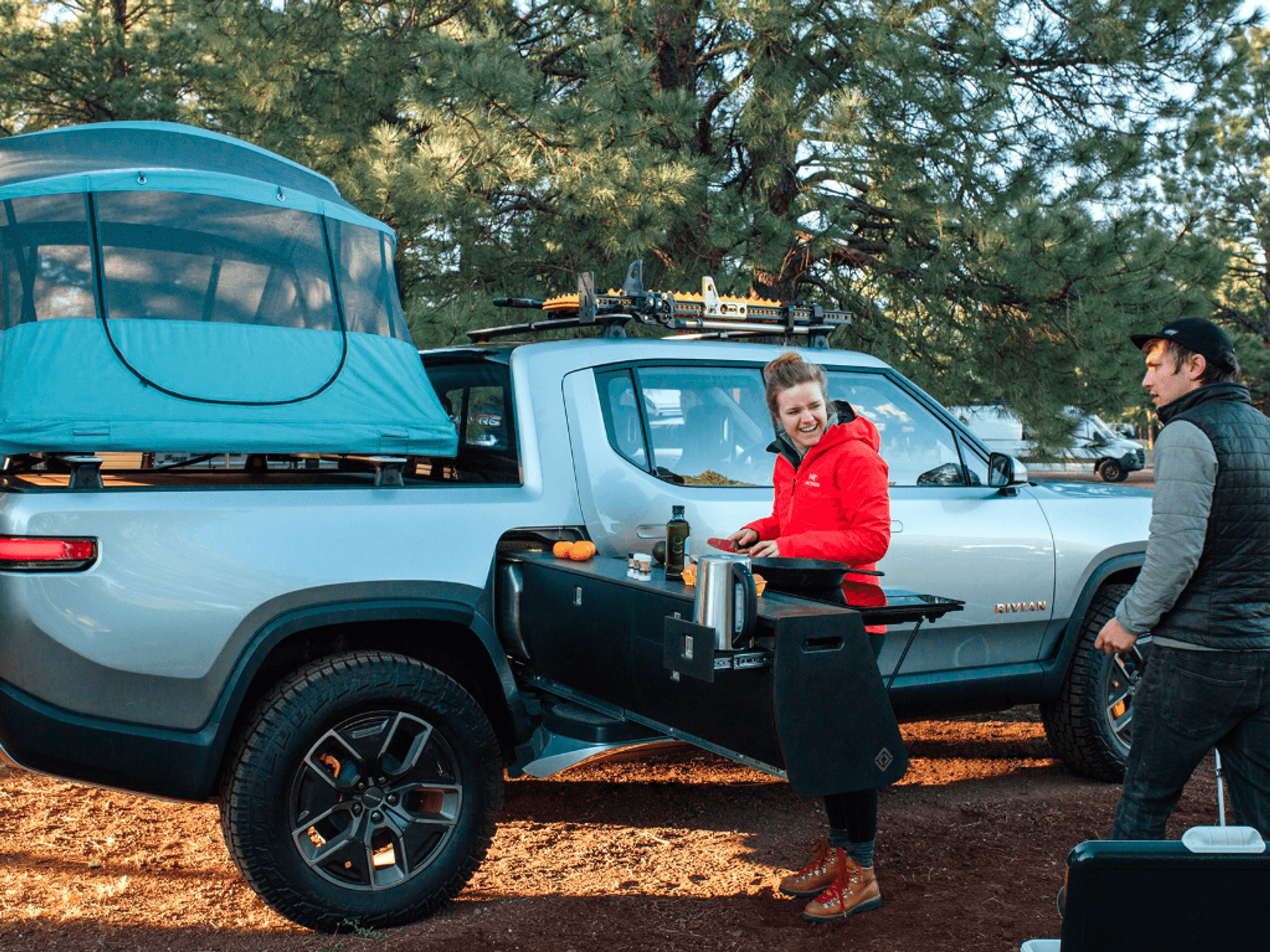 Rivian electric pickup truck has a slide-out camping kitchen - Gearbrain