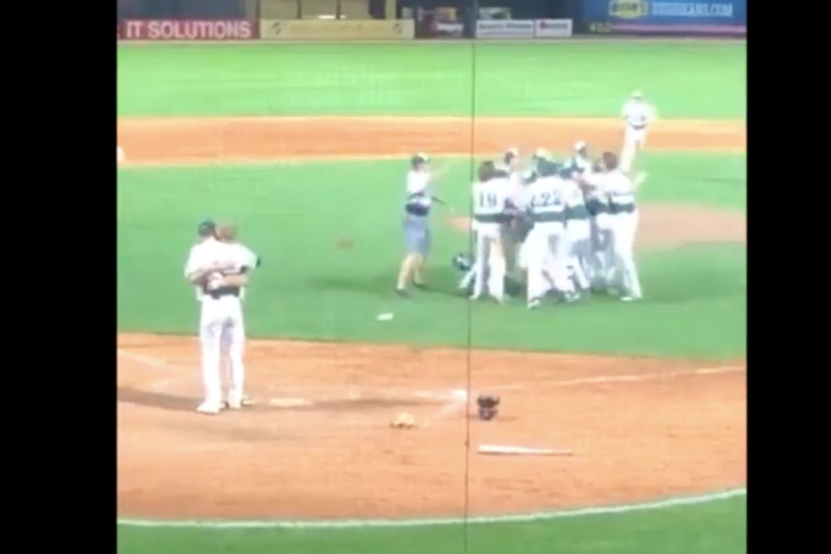A high schooler's reaction to striking out his childhood buddy is peak sportsmanship AND peak friendship.