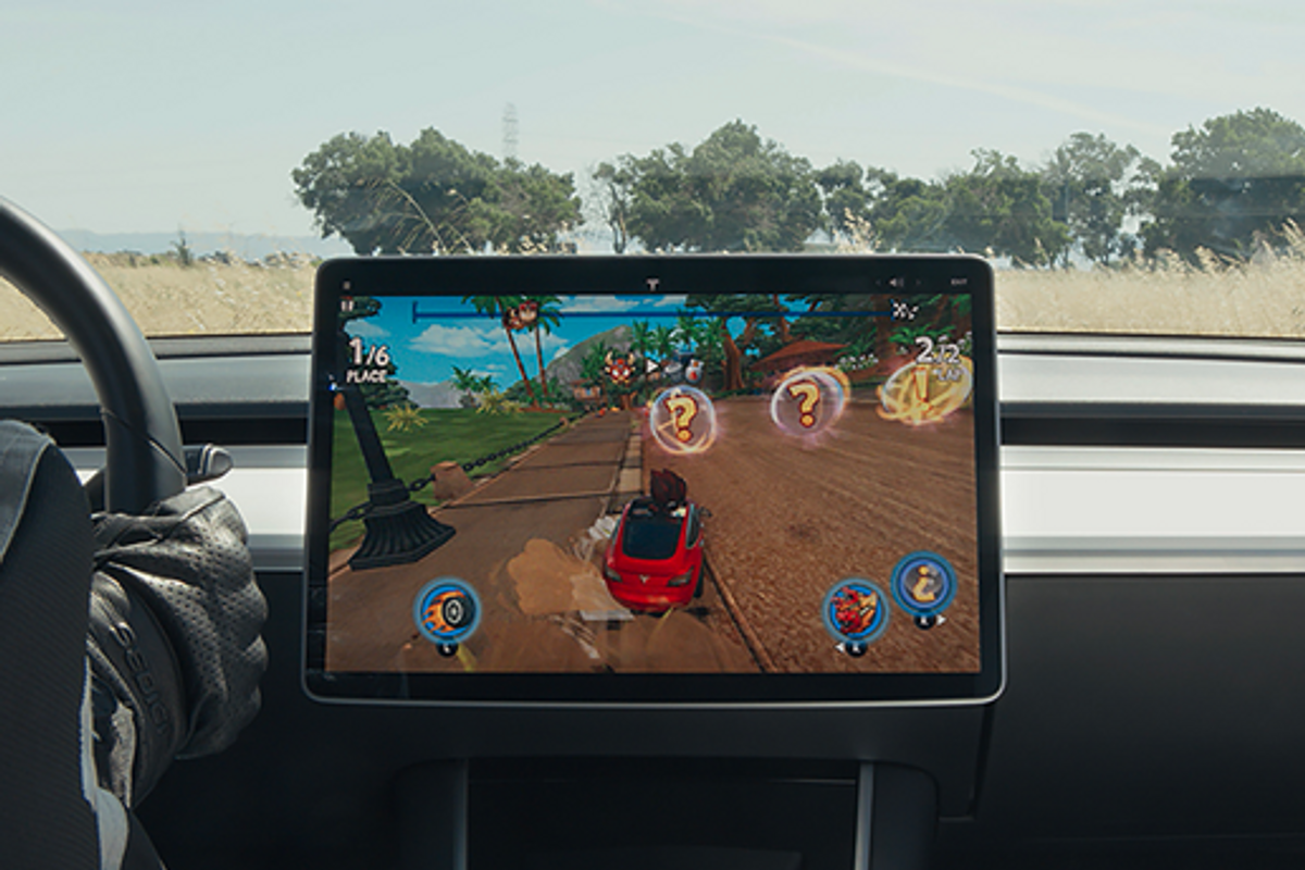 New Tesla racing game uses steering wheel and brake pedal as controller
