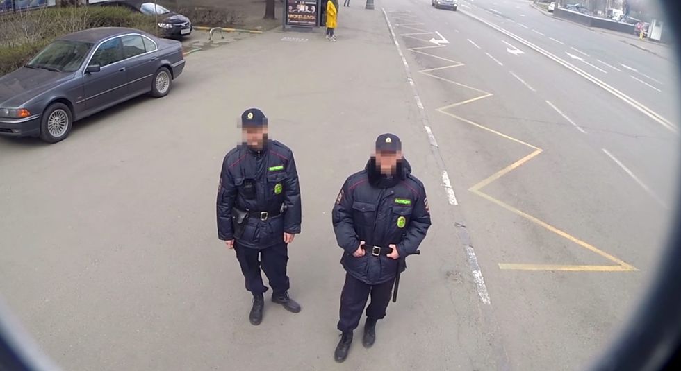 Sneaky Billboard Disappears in the Presence of Russian Authorities