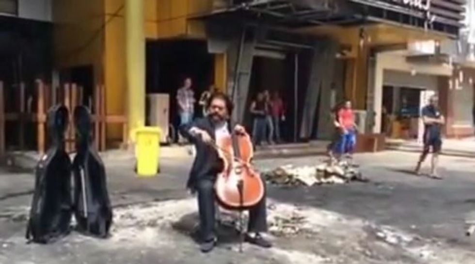 At Baghdad’s Bomb Sites, Chaos, and a Cellist Playing Music