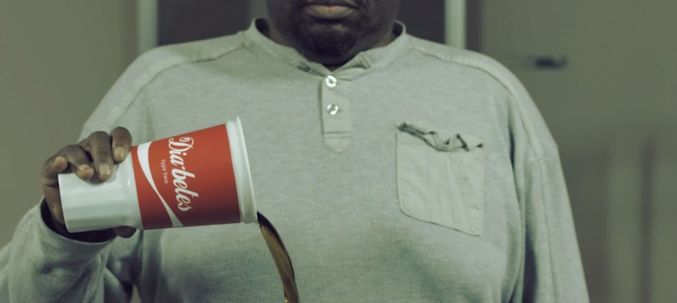 New Ad Viciously Spoofs Iconic Coke Commercial to Stress Soda Risks