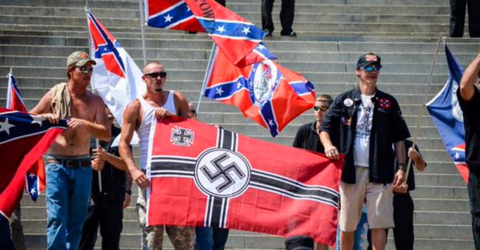 Photo of Black Officer Helping Supremacist at KKK Rally Going Viral