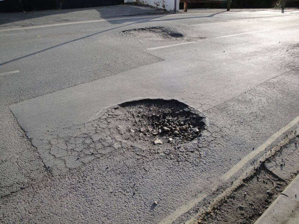 When This City Couldn’t Fix Its Potholes, These ‘Guerrilla Road Radicals’ Stepped Up Instead