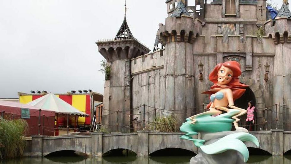 Welcome to Banksy’s Twisted Version of Disneyland