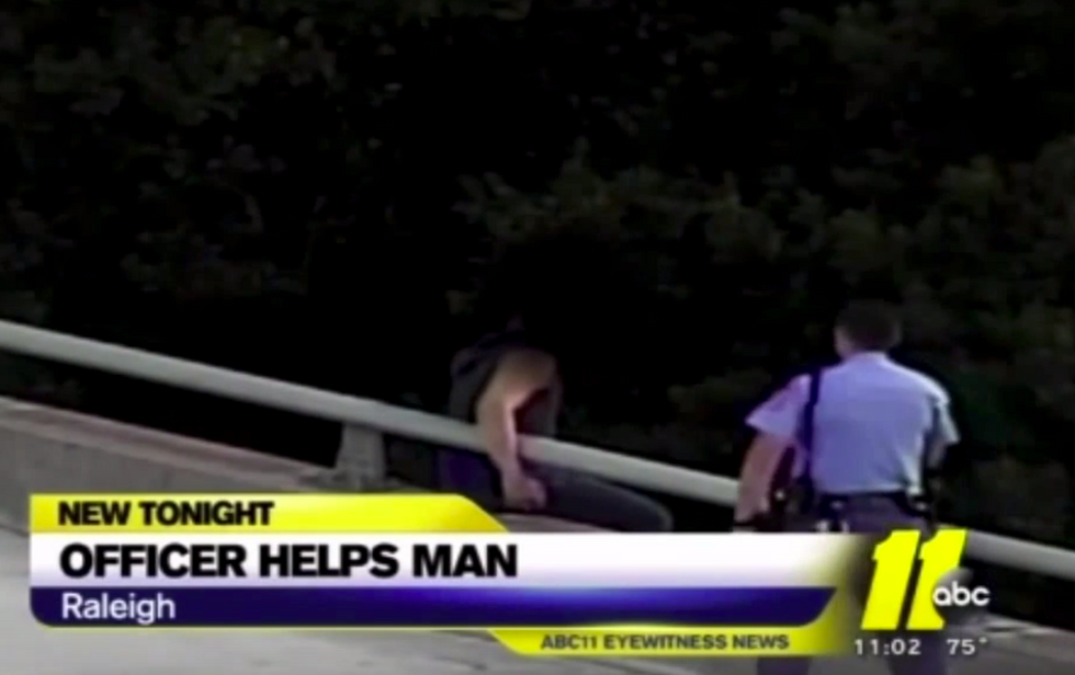 Police Officer Talks Man Down From Bridge; Gives Him a Hug.
