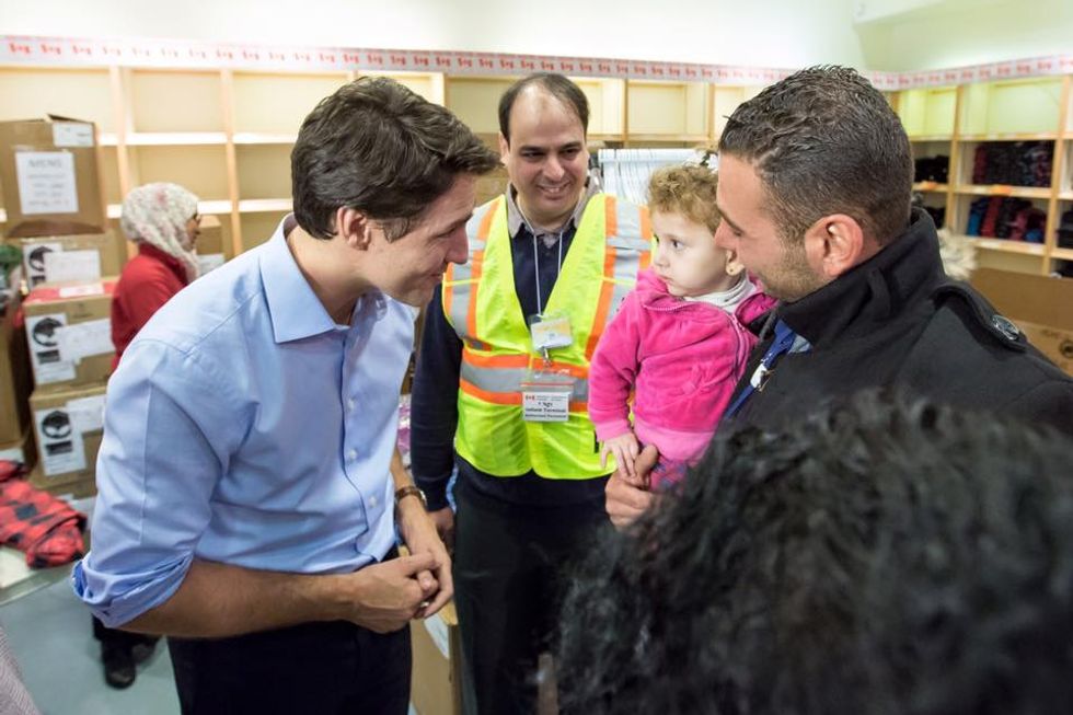 Prime Minister Justin Trudeau Greets Syrian Refugees at the Airport