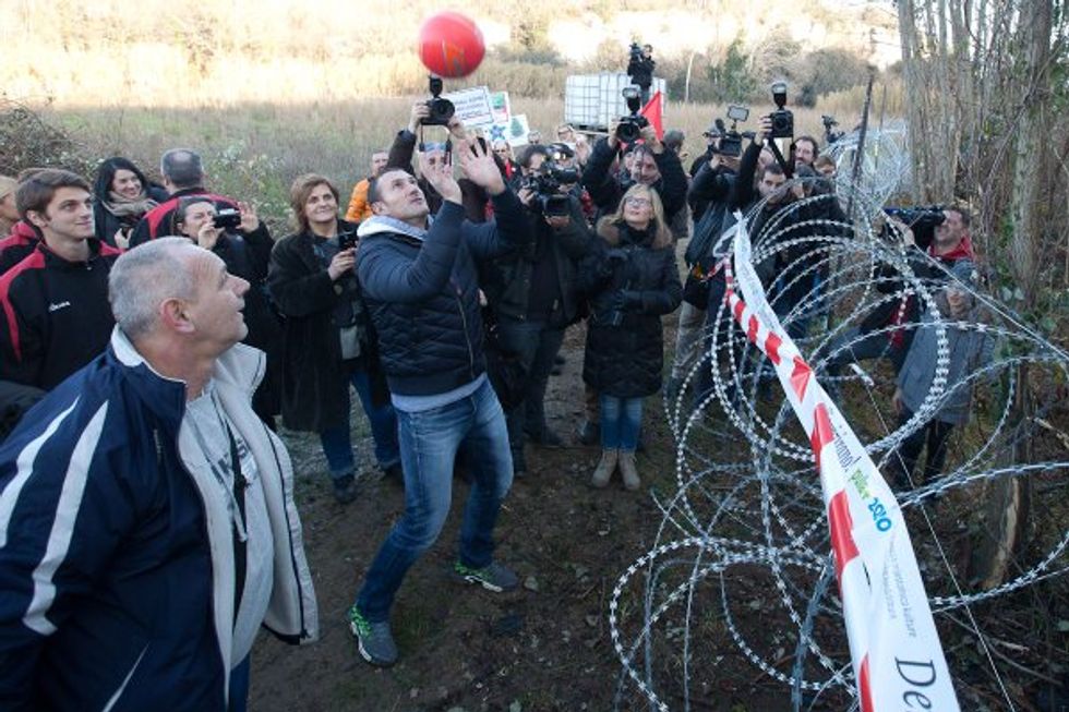 Protesters Play a Delightful Game of Volleyball Across the Slovenia-Croatia Border Fence