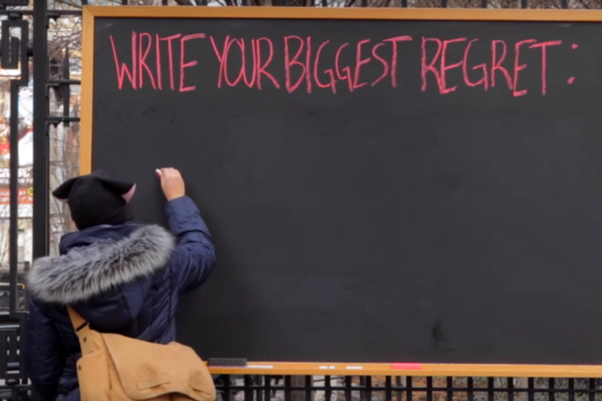New Yorkers share their biggest regrets on a blackboard