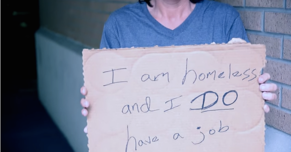 Homeless People Share Their Stories on a Piece of Cardboard