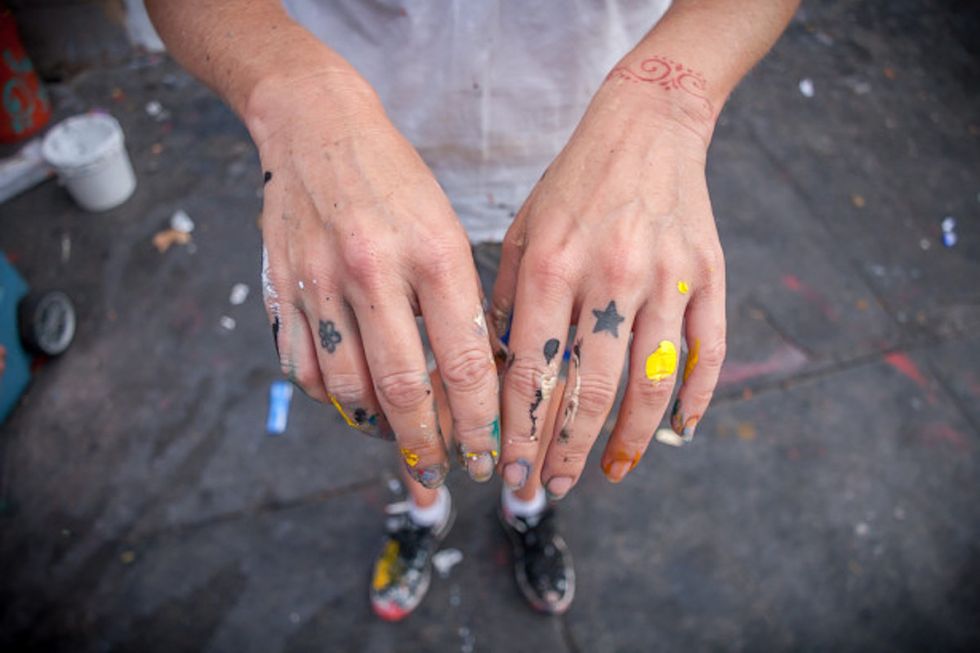 How an Artist Uses Her Pain to Make Incredible Political Street Art
