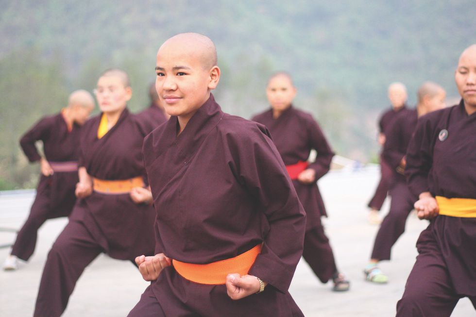These “Kung Fu Nuns” Are Biking The Himalayas For The Best Reason
