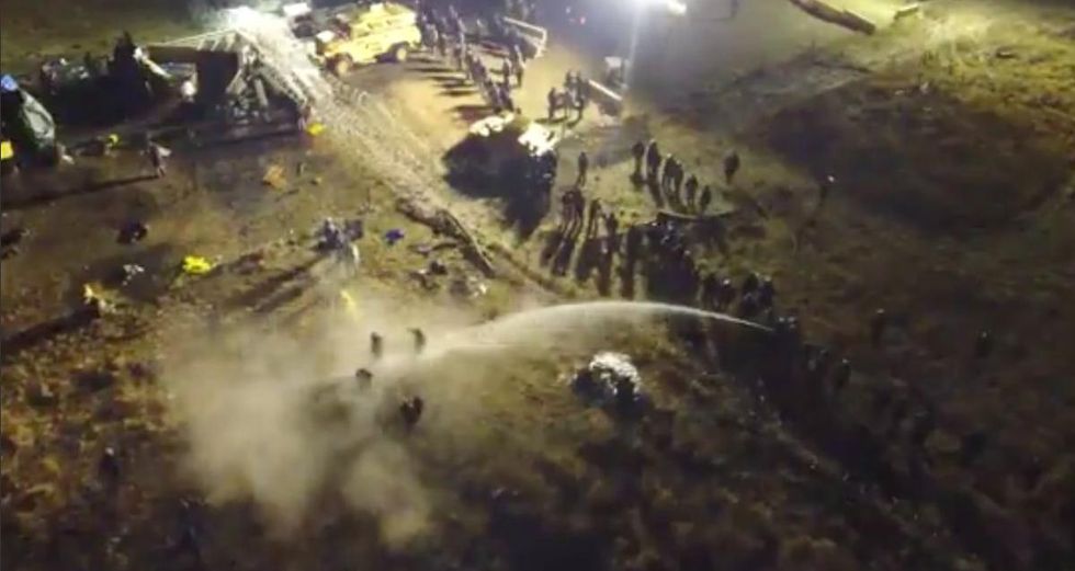 Law Enforcement Turn Water Cannons, Use Tear Gas And Rubber Bullets On Protesters At Standing Rock