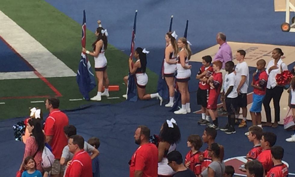 The Protesting Cheerleaders At Trump’s Alma Mater
