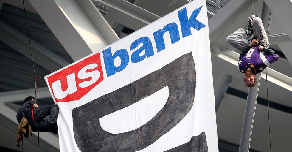 Banner Protesting Dakota Access Pipeline Drops From The Roof Of Stadium During Vikings Game
