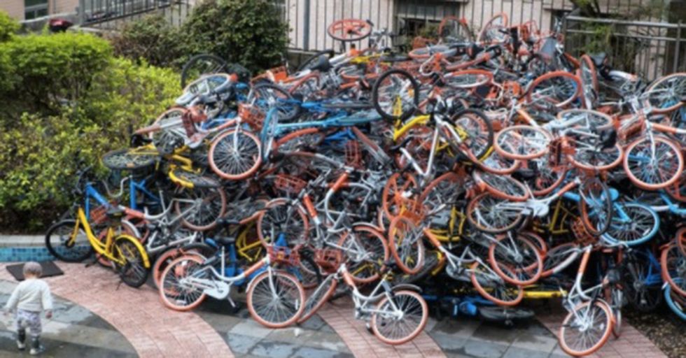 Giant Piles Of Discarded ‘Shared Bikes’ Are Turning Chinese Sidewalks Into Dumping Grounds