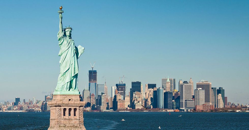 A ‘Refugees Welcome’ Banner Was Just Unfurled On The Statue Of Liberty