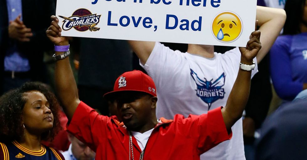 Dad uses awesome signs at NBA games to taunt son about his grades.