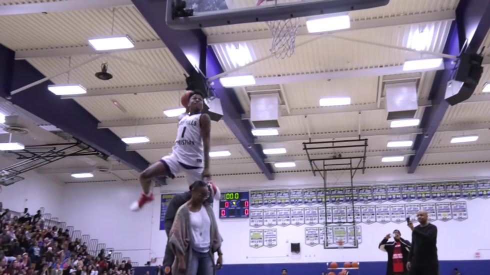 High School Basketball Star Dunks Over Mom And Dad To Win Contest