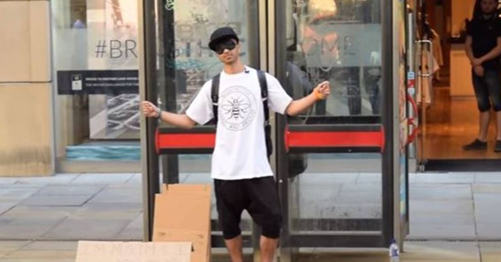 Blindfolded Muslim Man Offers Hugs To Grieving Mancunians