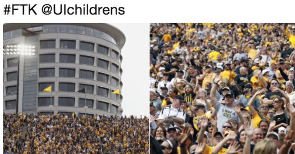 College Football Crowd Stops To Wave To Children At Nearby Hospital