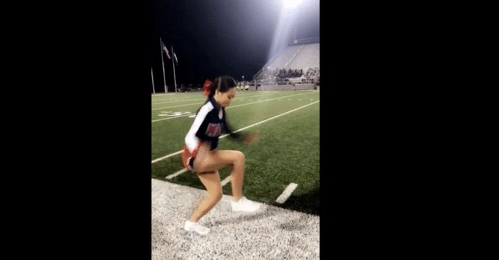 Cheerleader's Routine Looks Like She's Actually Using Magic
