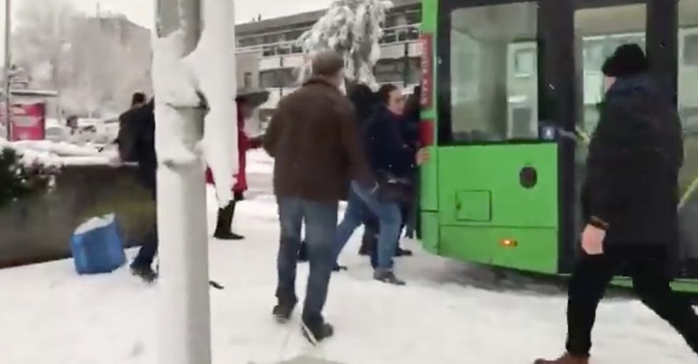 Random Act Of Sports: Stranded Passengers Teamed Up To Battle Bus Stuck On A Snowy Hill