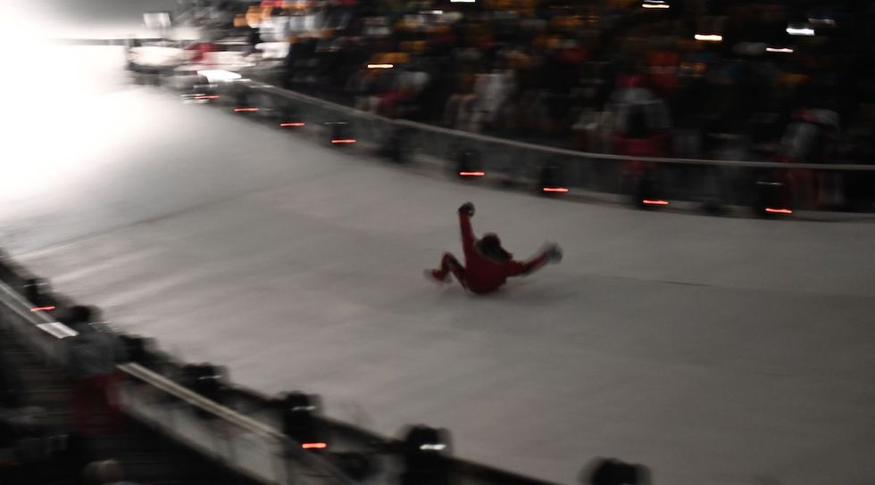 A Fearless Fan Snuck His Way Onto An Icy Slide During The Olympics Opening Ceremony