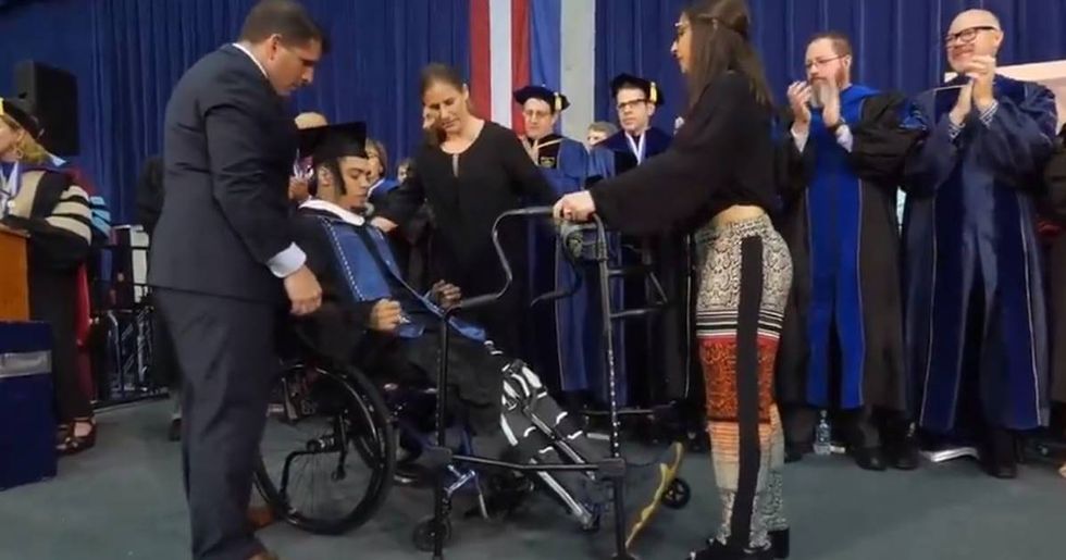 After Being Partially Paralyzed, A Former Georgetown Linebacker Walks For The First Time At Graduation