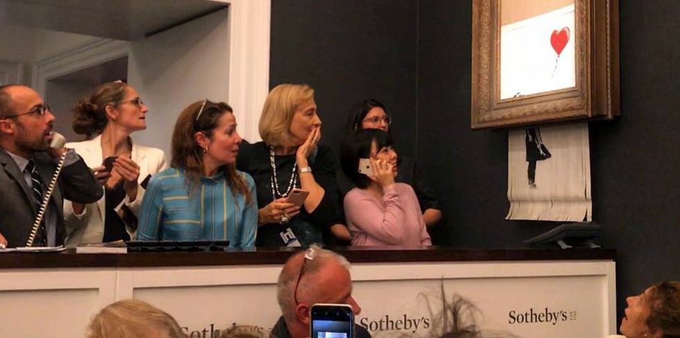 Banksy reveals how he built his 'self-destructing' painting that shredded after auction.
