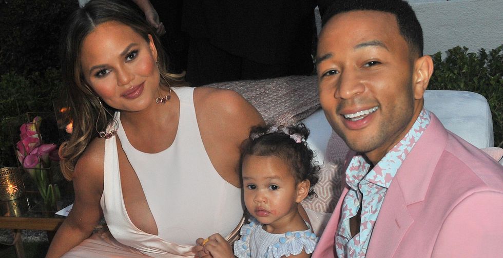 Parents are sharing pictures of their kids in helmets to support Chrissy Teigen’s son.