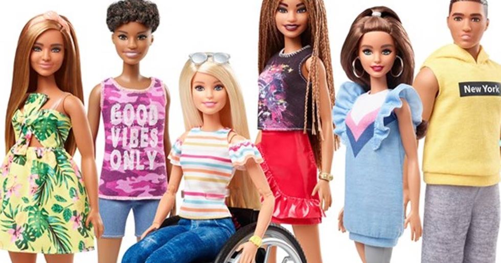 Mattel adds two Barbies with disabilities to its new line of dolls.