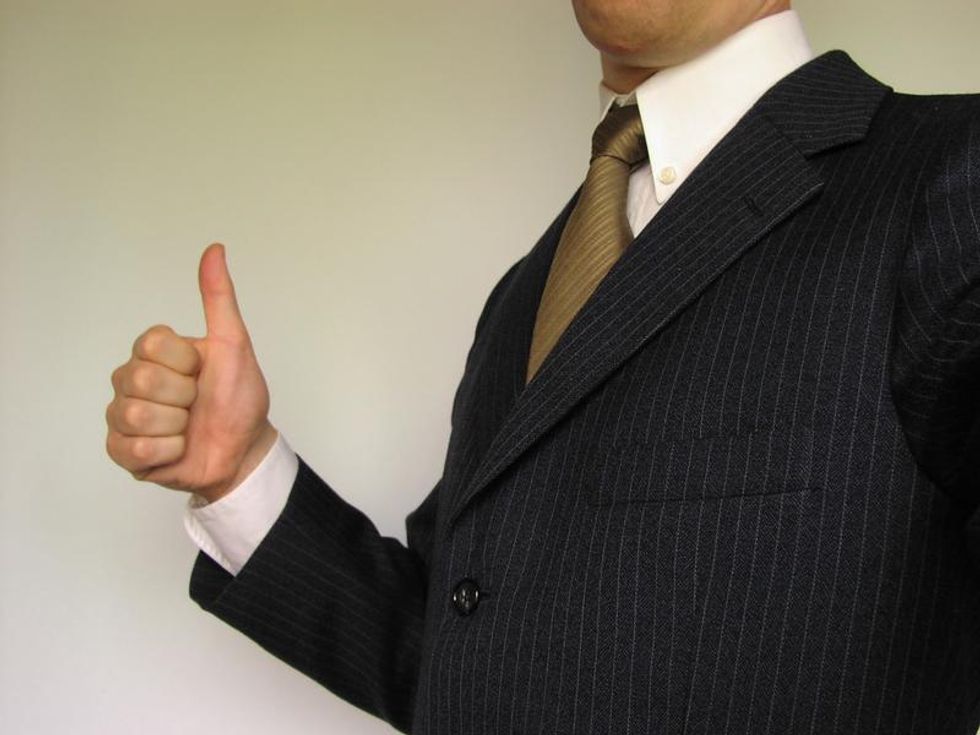 How your employer uses perks like wellness programs, phones and free food to control your life