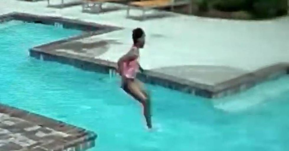 A surveillance camera caught intense footage of a ten-year-old girl saving her infant sister from drowning.