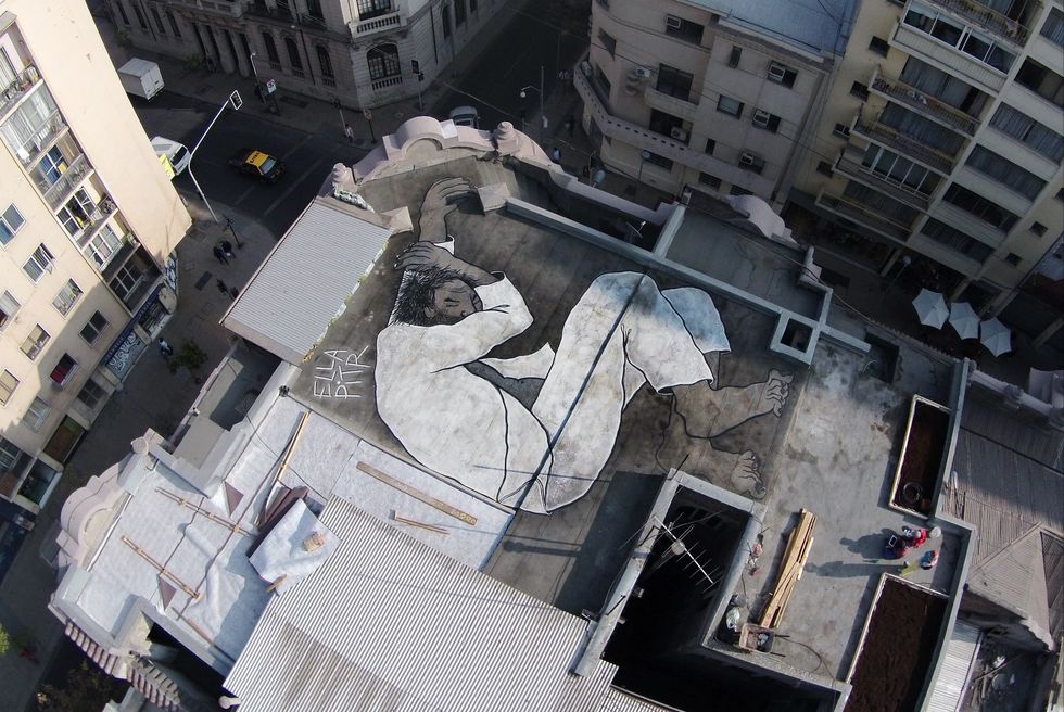 Hidden on Rooftops Around the World, These Sleeping Giants Encourage Us to See Our Cities From a New Perspective
