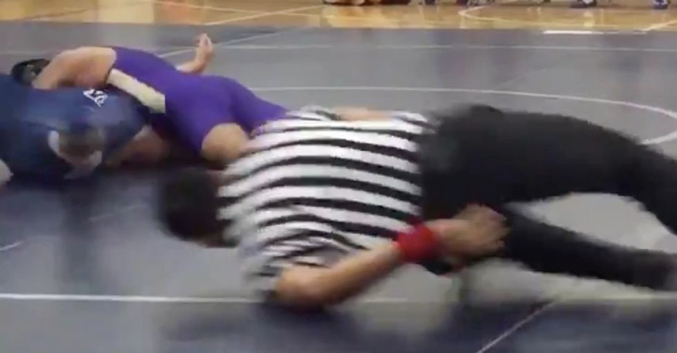 This Dedicated Wrestling Ref Moves Like A Cartoon Character To Keep His Eyes On The Action